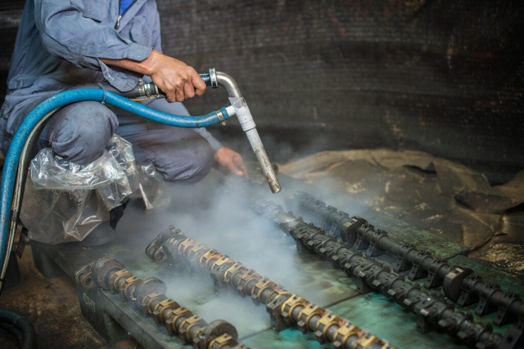 Professional dry ice cleaning removing contaminants from metal surfaces
