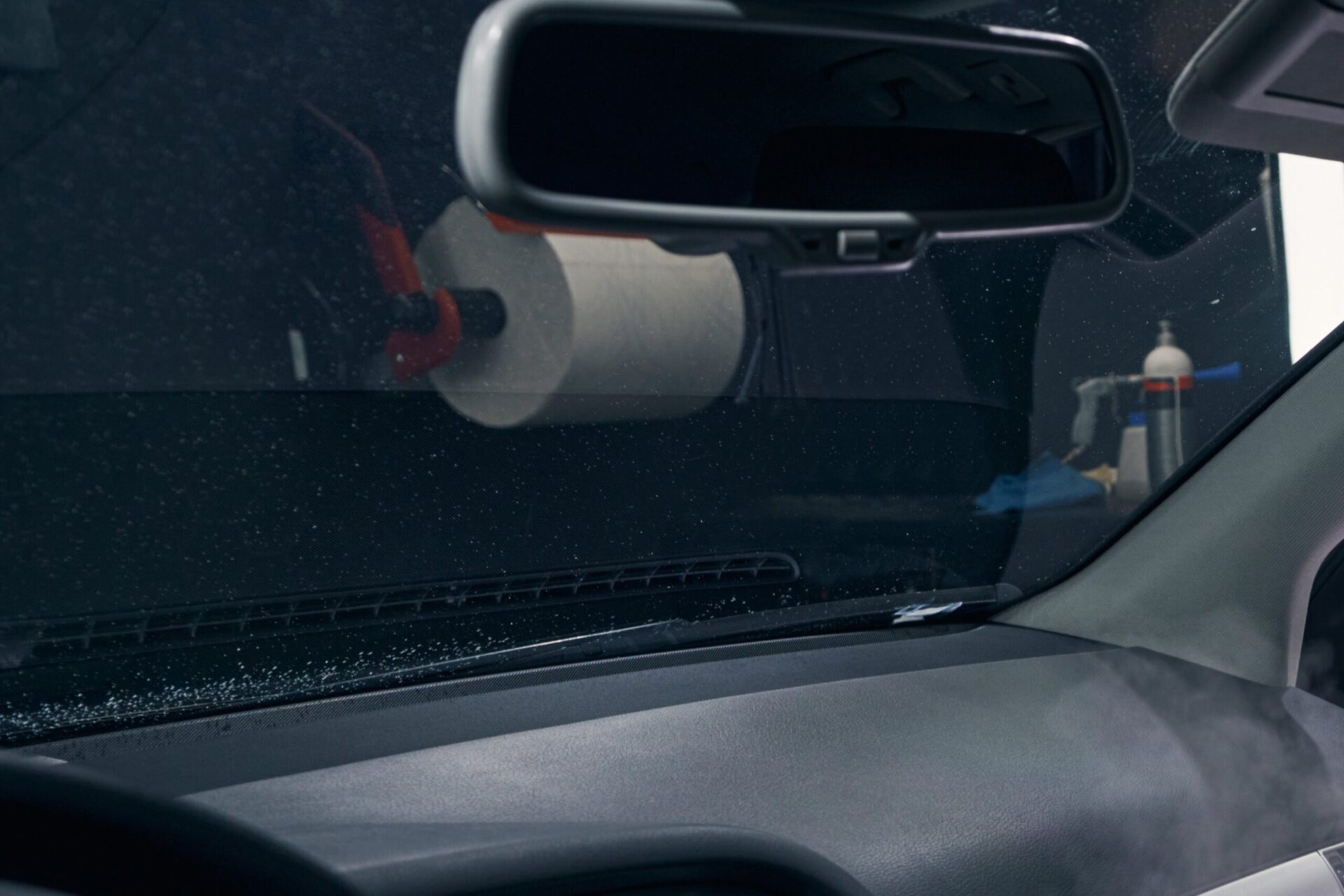 Man Leaning and Dry Cleaning Car Split Top Right Image